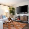 living room with a large window and open spaces