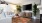 a living room with a tv and couches